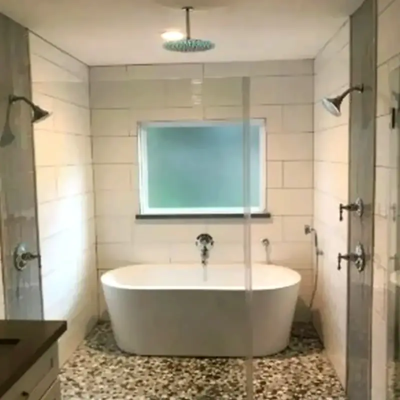 Completed bathroom remodel with freestanding tub